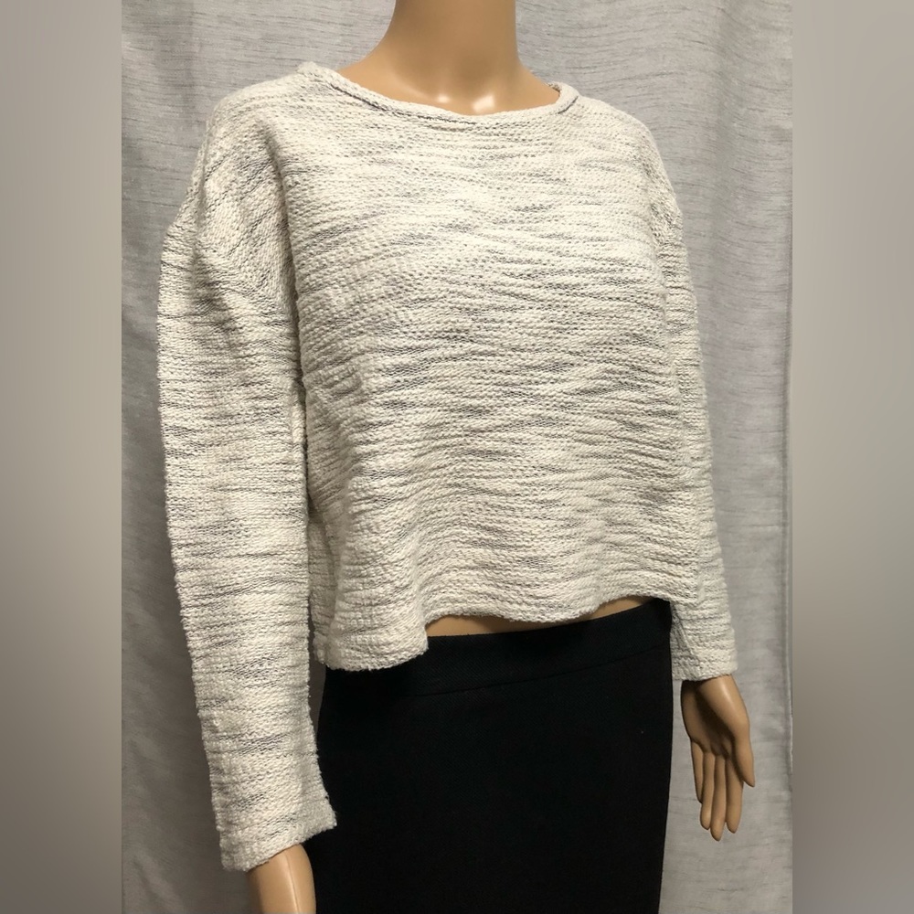 White sweater.